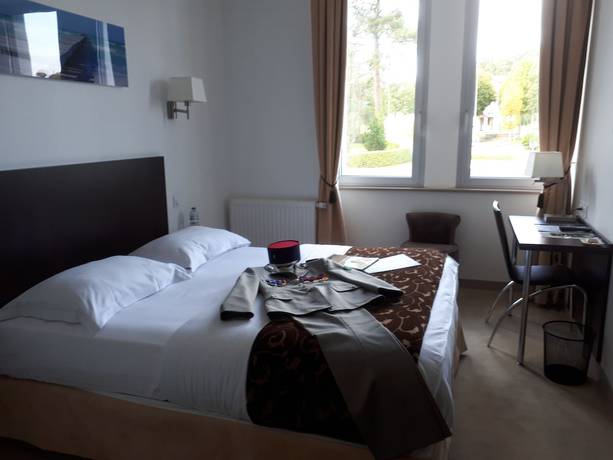 Imagen de la habitación del Hotel H&ocirc;tel Le Bellevue, L'Enclos. Foto 14