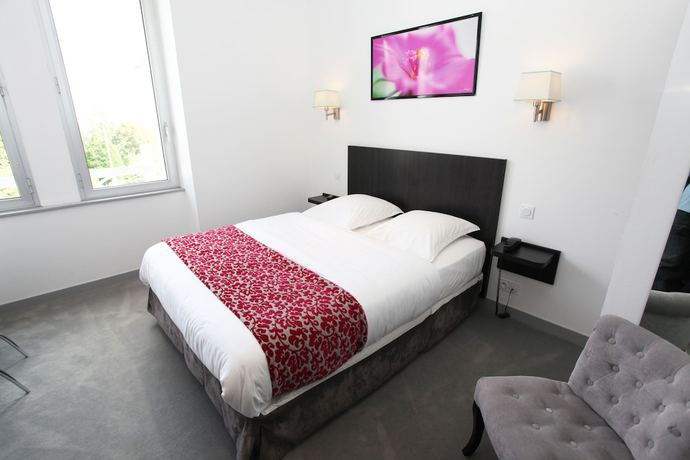 Imagen de la habitación del Hotel H&ocirc;tel Le Bellevue, L'Enclos. Foto 15