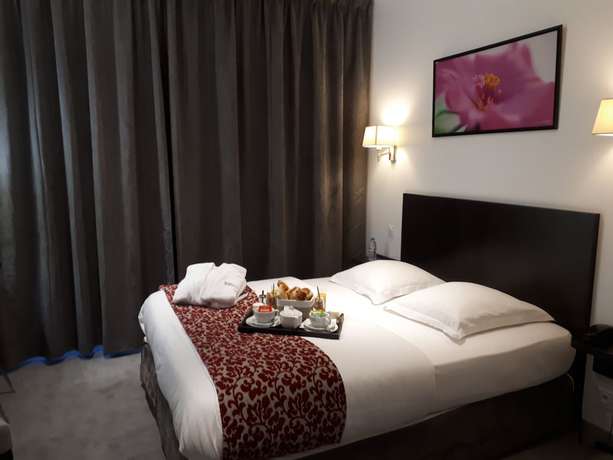 Imagen de la habitación del Hotel H&ocirc;tel Le Bellevue, L'Enclos. Foto 17