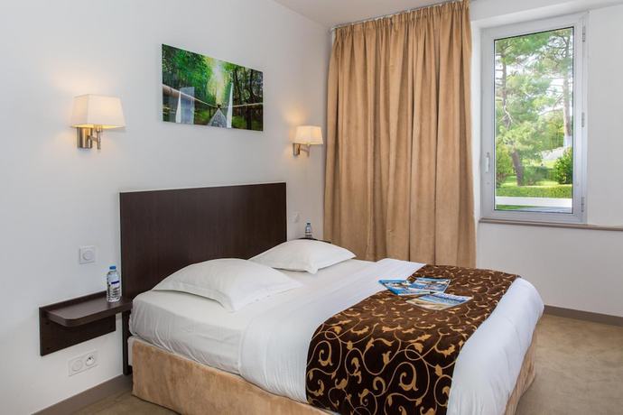 Imagen de la habitación del Hotel H&ocirc;tel Le Bellevue, L'Enclos. Foto 18
