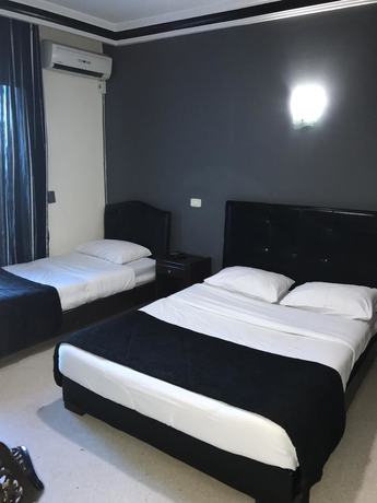 Imagen de la habitación del Hotel Hôtel Le Calife. Foto 7