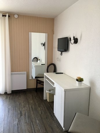Imagen de la habitación del Hotel H&ocirc;tel Le Catinat Fleuri. Foto 7