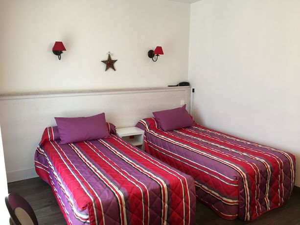 Imagen de la habitación del Hotel H&ocirc;tel Le Catinat Fleuri. Foto 11