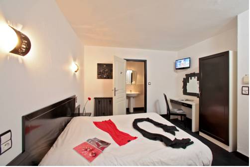 Imagen de la habitación del Hotel H&ocirc;tel Le Coin Des Halles. Foto 8