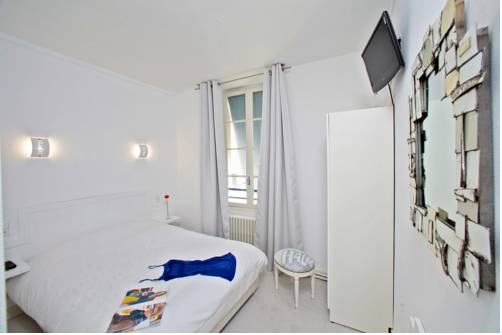 Imagen de la habitación del Hotel H&ocirc;tel Le Coin Des Halles. Foto 12