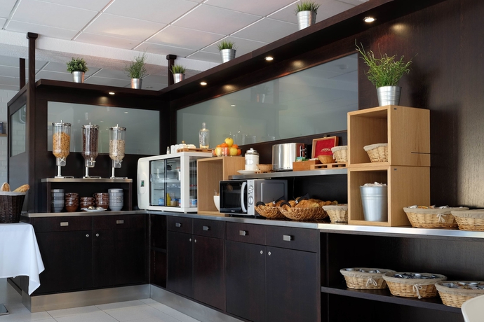 Imagen del bar/restaurante del Hotel Hôtel Le Collier. Foto 2