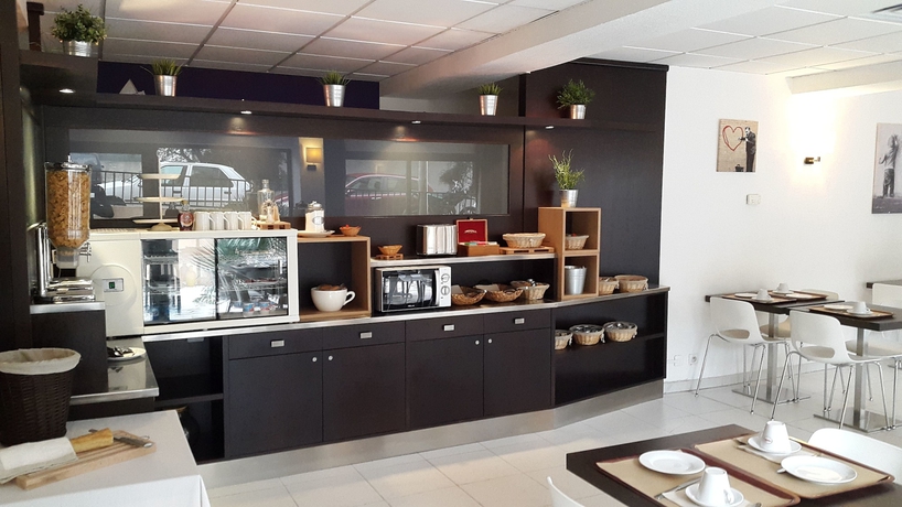 Imagen del bar/restaurante del Hotel Hôtel Le Collier. Foto 3