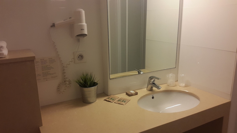 Imagen de la habitación del Hotel Hôtel Le Collier. Foto 11