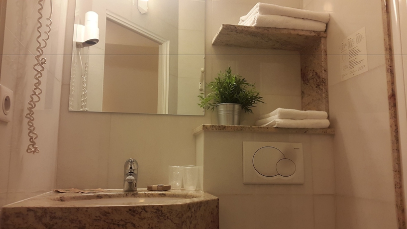 Imagen de la habitación del Hotel Hôtel Le Collier. Foto 12