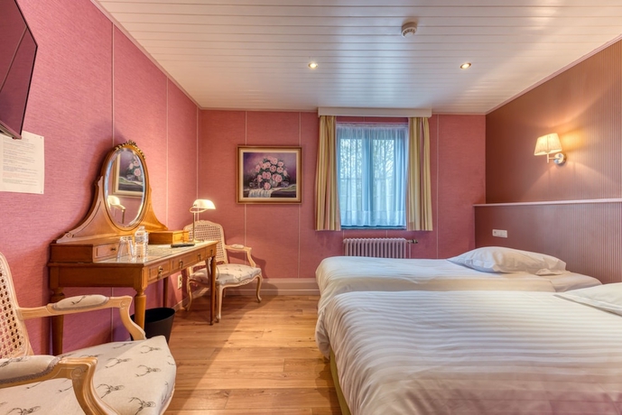 Imagen de la habitación del Hotel H&ocirc;tel Le Cor de Chasse. Foto 3