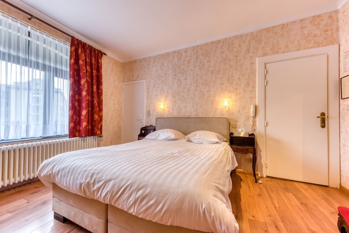 Imagen de la habitación del Hotel H&ocirc;tel Le Cor de Chasse. Foto 10
