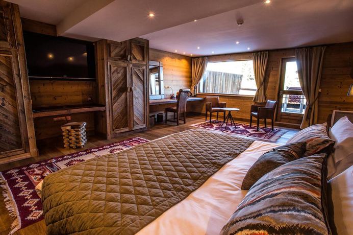 Imagen de la habitación del Hotel Hôtel Le Courcheneige. Foto 14