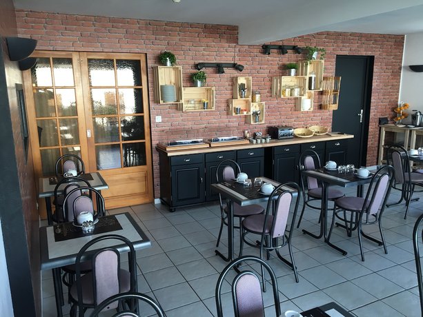 Imagen del bar/restaurante del Hotel H&ocirc;tel Le Dauphin, Saint-Benoit-sur-Loire. Foto 7