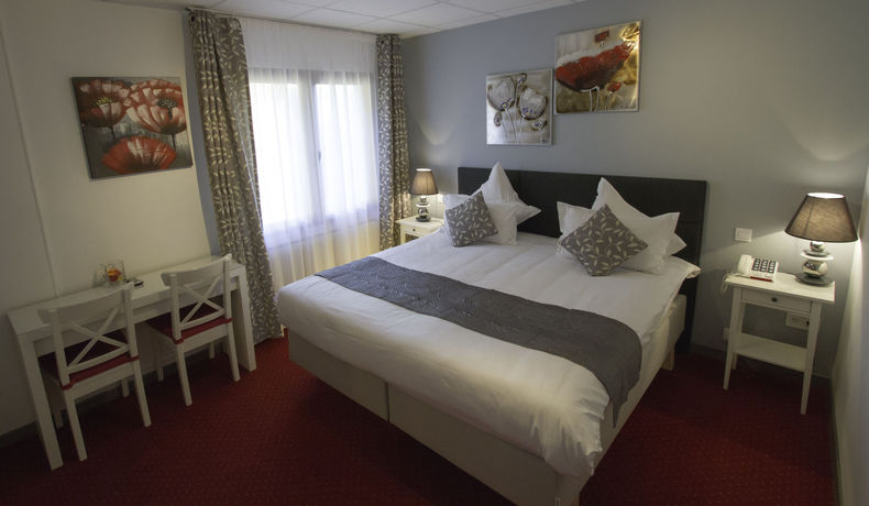 Imagen de la habitación del Hotel Hôtel Le Divona. Foto 2