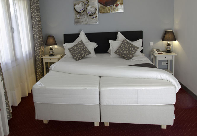 Imagen de la habitación del Hotel Hôtel Le Divona. Foto 7