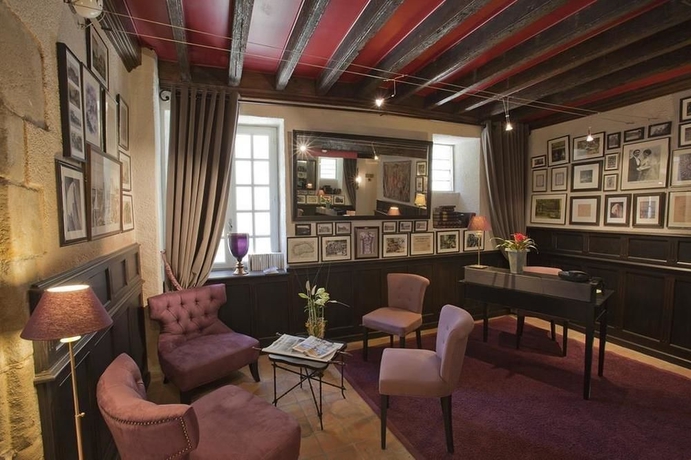 Imagen de los interiores del Hotel Hôtel Le Donjon - Cœur de la Cité Médiévale. Foto 13