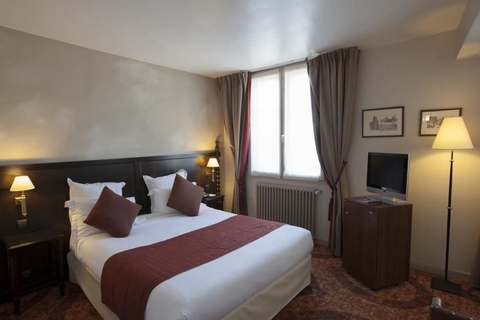 Imagen de la habitación del Hotel Hôtel Le Donjon - Cœur de la Cité Médiévale. Foto 9