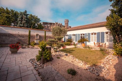 Imagen de la habitación del Hotel H&ocirc;tel Le Donjon - C&oelig;ur de la Cit&eacute; M&eacute;di&eacute;vale. Foto 6