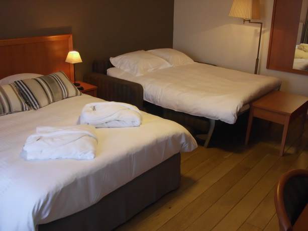 Imagen de la habitación del Hotel H&ocirc;tel Le Fournil. Foto 10