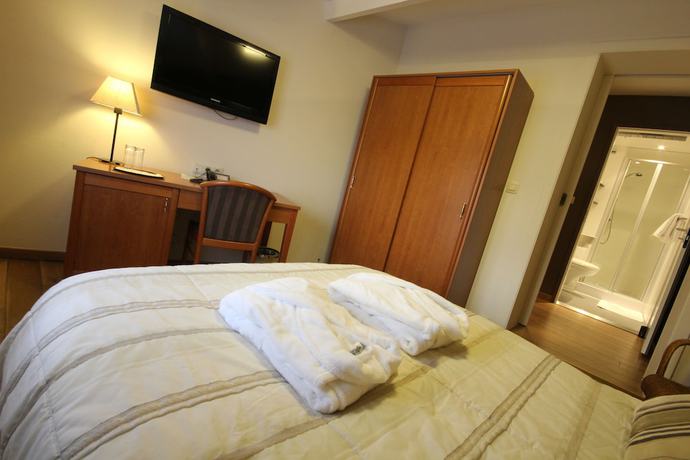 Imagen de la habitación del Hotel H&ocirc;tel Le Fournil. Foto 20