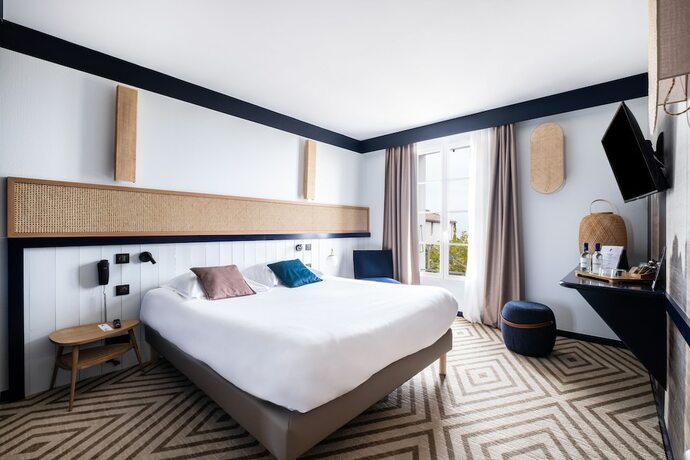 Imagen de la habitación del Hotel H&ocirc;tel Le Fran&ccedil;ais, La Flotte. Foto 13
