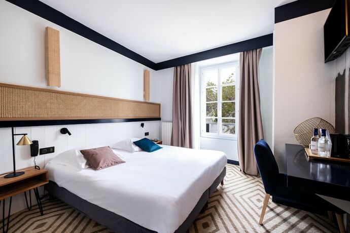 Imagen de la habitación del Hotel H&ocirc;tel Le Fran&ccedil;ais, La Flotte. Foto 17
