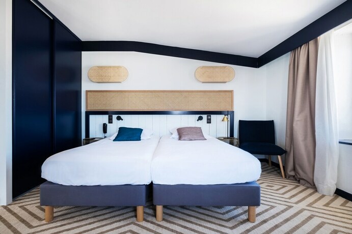 Imagen de la habitación del Hotel H&ocirc;tel Le Fran&ccedil;ais, La Flotte. Foto 20