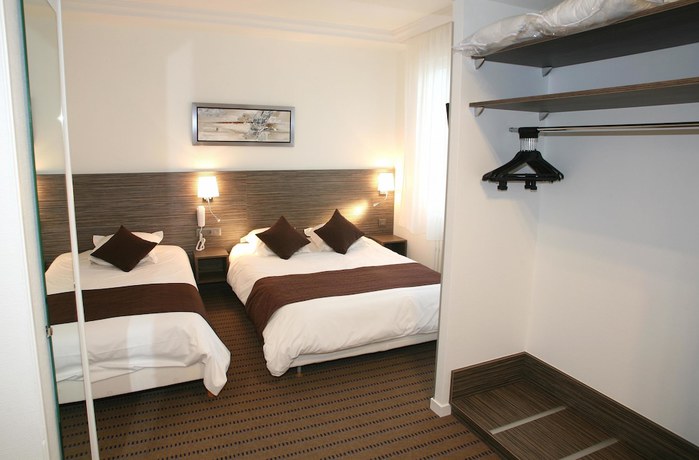 Imagen de la habitación del Hotel H&ocirc;tel Le Louvre, Cherburgo-Octeville. Foto 12