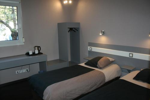 Imagen de la habitación del Hotel H&ocirc;tel Le Luron. Foto 6