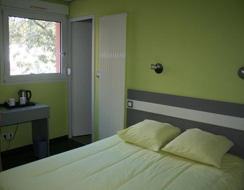 Imagen de la habitación del Hotel H&ocirc;tel Le Luron. Foto 7