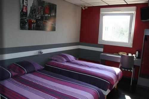 Imagen de la habitación del Hotel H&ocirc;tel Le Luron. Foto 8