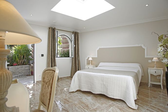 Imagen de la habitación del Hotel H&ocirc;tel Le Magnolia. Foto 7