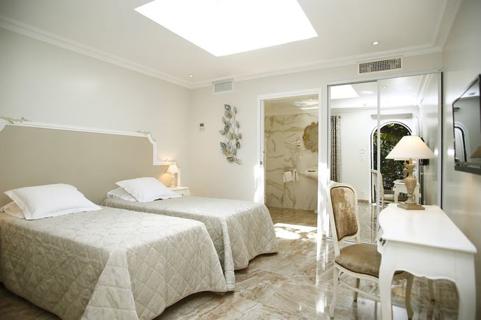 Imagen de la habitación del Hotel H&ocirc;tel Le Magnolia. Foto 13