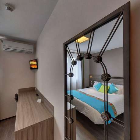 Imagen de la habitación del Hotel H&ocirc;tel Le Majestic. Foto 19