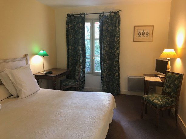 Imagen de la habitación del Hotel H&ocirc;tel Le Moulin de la Beune. Foto 11