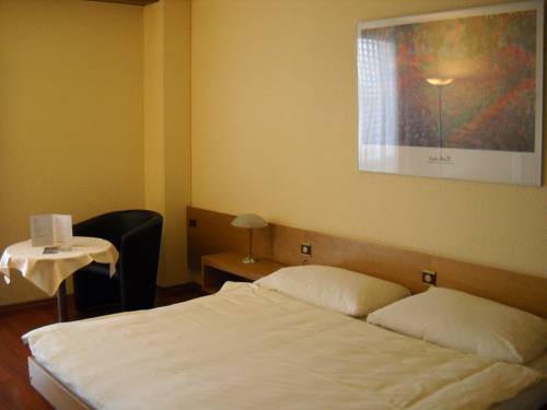 Imagen de la habitación del Hotel H&ocirc;tel Le National, Del&eacute;mont. Foto 8