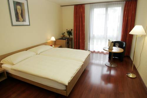 Imagen de la habitación del Hotel H&ocirc;tel Le National, Del&eacute;mont. Foto 12
