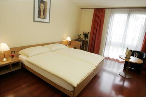 Imagen de la habitación del Hotel H&ocirc;tel Le National, Del&eacute;mont. Foto 13