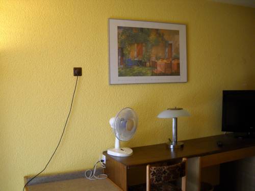 Imagen de la habitación del Hotel H&ocirc;tel Le National, Del&eacute;mont. Foto 16