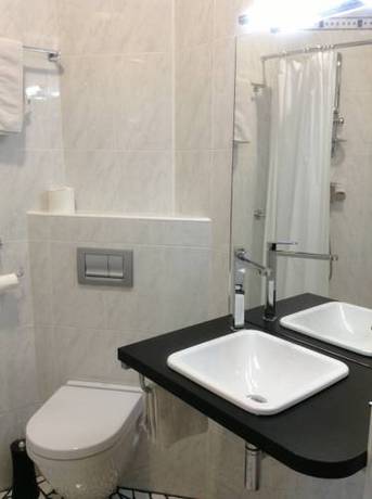 Imagen de la habitación del Hotel Hôtel Le National. Foto 2