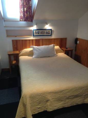 Imagen de la habitación del Hotel Hôtel Le National. Foto 10