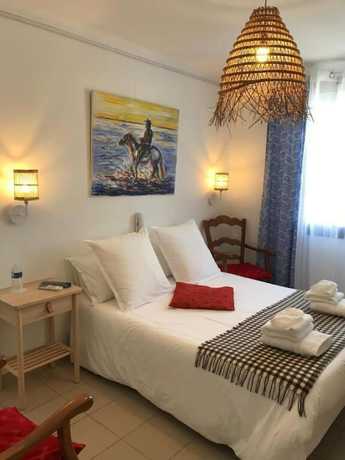 Imagen de la habitación del Hotel H&ocirc;tel Le Neptune en Camargue. Foto 4