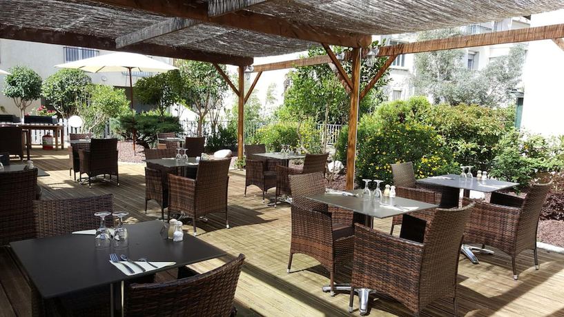 Imagen del bar/restaurante del Hotel H&ocirc;tel Le Palmarium. Foto 3