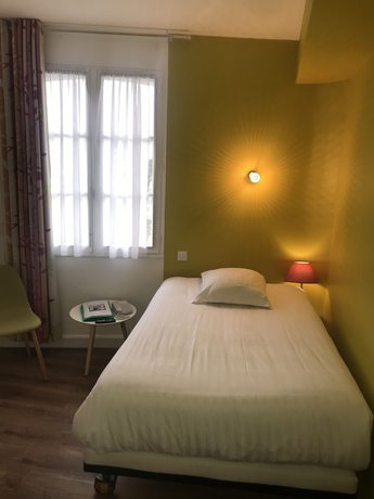 Imagen de la habitación del Hotel H&ocirc;tel Le Petit Billot. Foto 10
