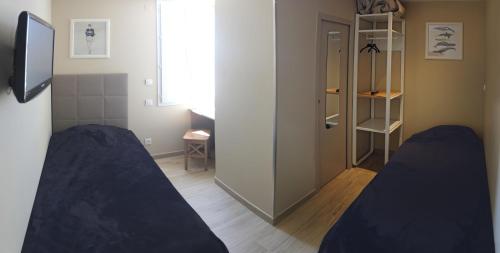 Imagen de la habitación del Hotel H&ocirc;tel Le Printemps. Foto 7