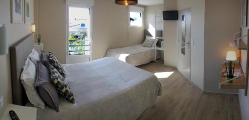 Imagen de la habitación del Hotel H&ocirc;tel Le Printemps. Foto 8