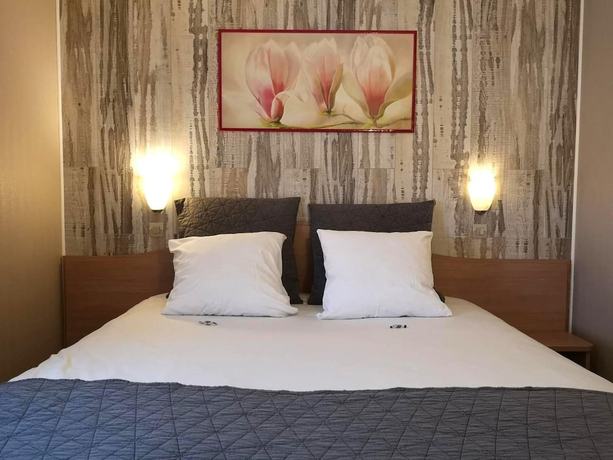 Imagen de la habitación del Hotel Hôtel Le Relais du Parisis. Foto 7