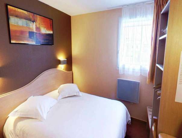 Imagen de la habitación del Hotel Hôtel Le Relais du Parisis. Foto 10