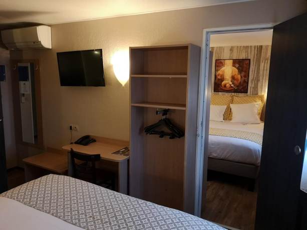 Imagen de la habitación del Hotel Hôtel Le Relais du Parisis. Foto 11