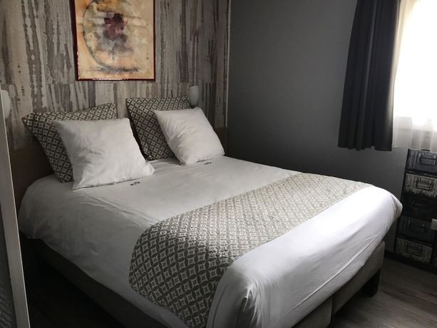 Imagen de la habitación del Hotel Hôtel Le Relais du Parisis. Foto 12